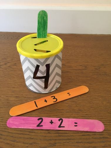 movement in the classroom ideas - Practice fine motor skills with slot cans and popsicle sticks