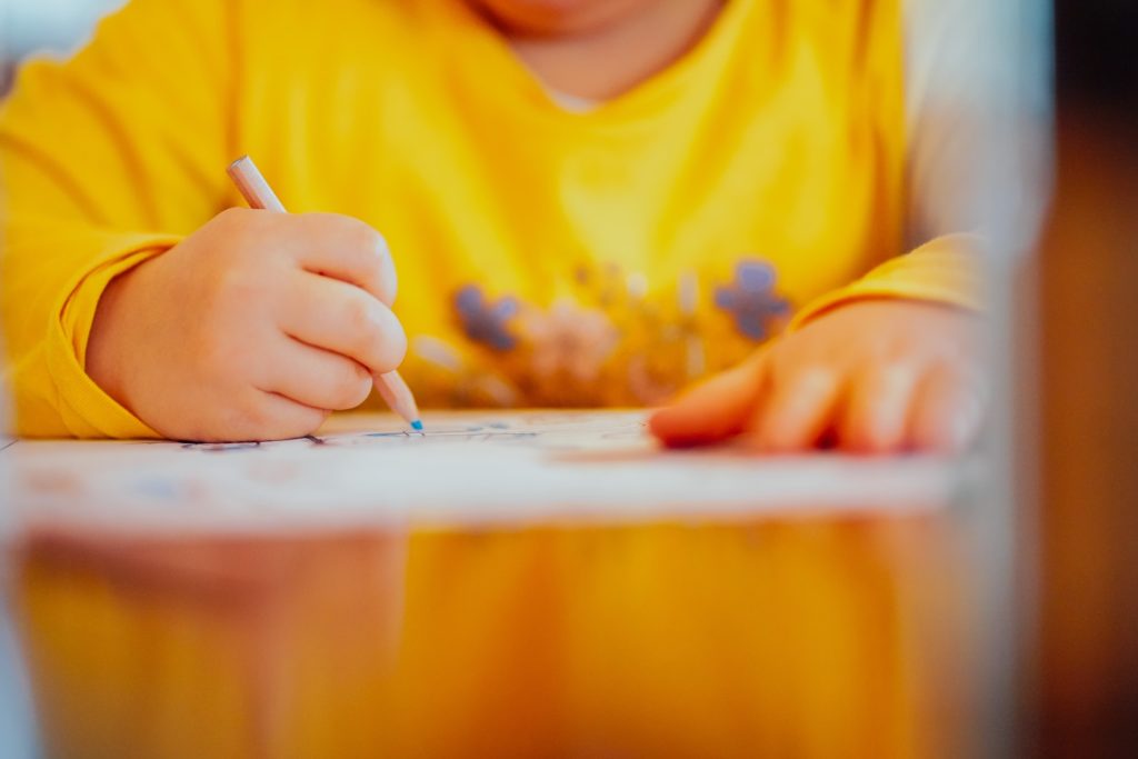 Kids doing pencil drawings